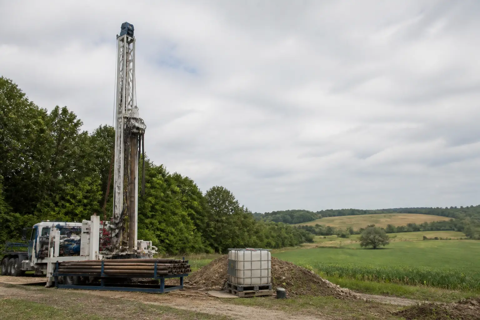 Water well drilling rig on a rural property